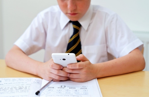 According to one headteacher, some pupils struggle to cope without their smartphoneALAMY